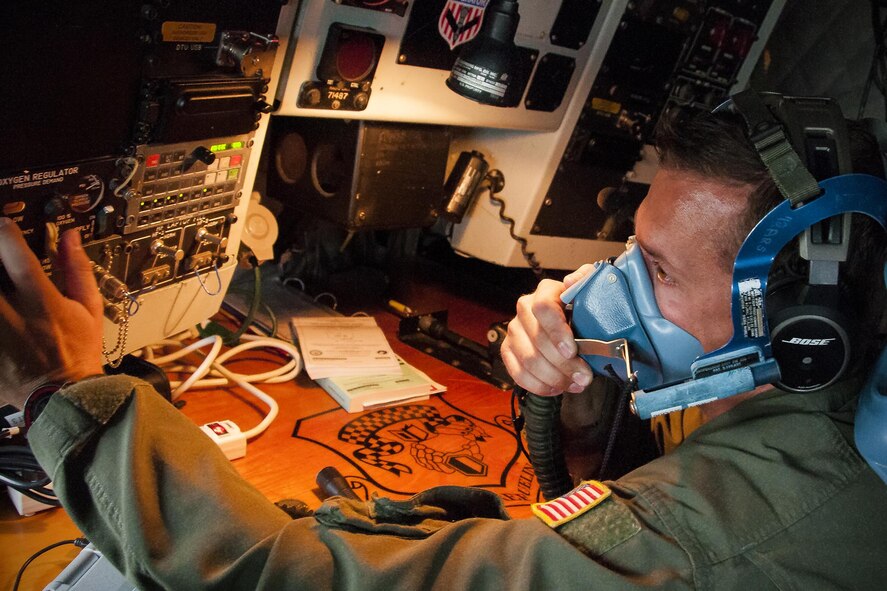 Technical Sgt. Casey Hall, 756th Air Refueling Squadron boom operator, checks an oxygen mask for proper function inside the cockpit of a KC-135R Stratotanker on the Royal Air Force Base Mildenhall, England, flight line June 13, 2016, prior to a refueling mission with the Norwegian Air Force. Members of the 459th Air Refueling Wing, to include pilots, boom operators and maintainers, are in England from mid-June to late July to help provide training and refueling support for Operation Atlantic Resolve. (U.S. Air Force photo/Staff Sgt. Kat Justen)