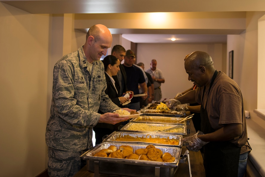 U.S. Air Force Airmen gather with local, state and federal law enforcement agencies during a luncheon hosted by the AF Office of Special Investigations Detachment 211, June 27, 2016, at Moody Air Force Base, Ga. AFOSI contributes to the Air Force’s five concentrated capabilities: protecting critical technologies and information, detecting and mitigating threats, providing global specialized services, conducting major criminal investigations and engaging foreign adversaries and threats offensively. 
(U.S. Air Force photo by Airman 1st Class Greg Nash/Released)
