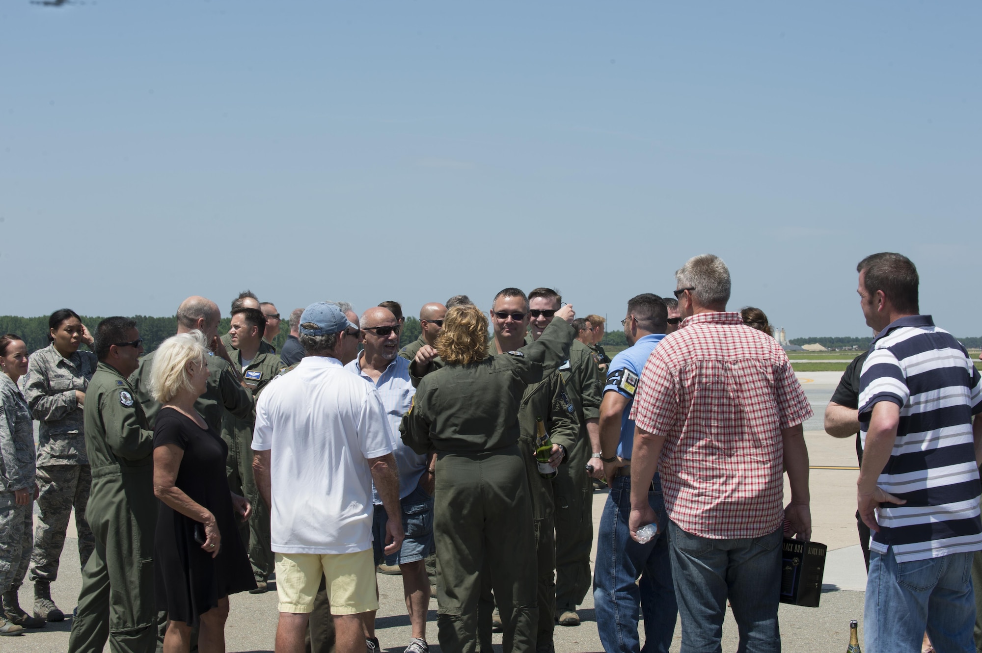 Maj. Christian Fiore and Senior Master Sgt. Kathleen Lambert, 512th Airlift Wing members, celebrated their final flight with friends and family June 27, 2016, at Dover Air Force Base, Del. Fiore has been at DAFB since 1991 and started his pilot training on this same day 14 years ago. Lambert has served with the 512th AW for 33 years and logged more than 11,000 flight hours. (U.S. Air Force Photo/ Tech. Sgt. Nathan Rivard)