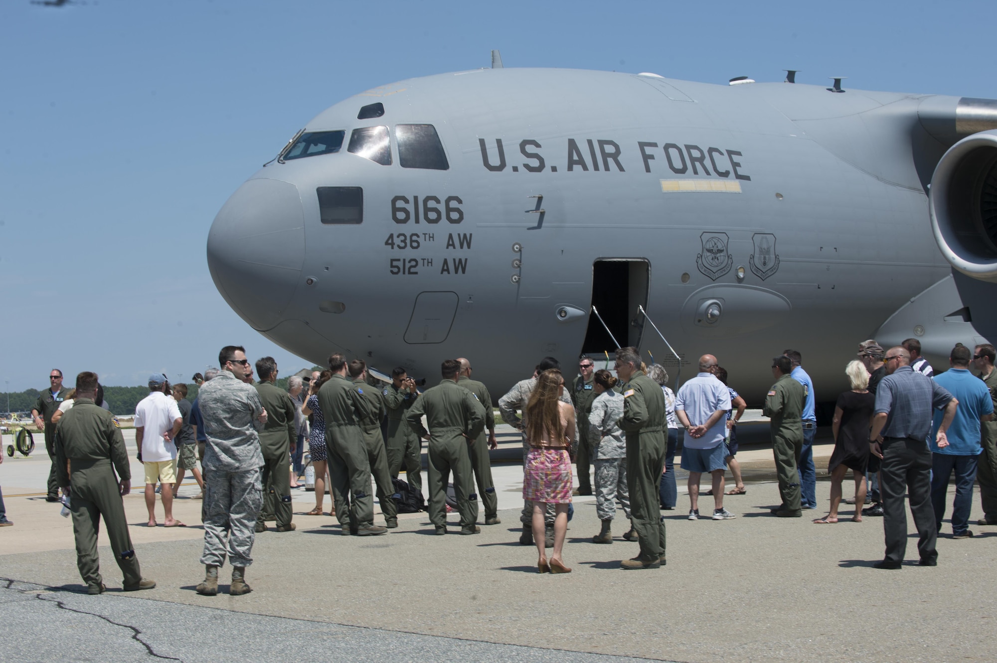 Maj. Christian Fiore and Senior Master Sgt. Kathleen Lambert, 512th Airlift Wing members, celebrated their final flight with friends and family June 27, 2016, at Dover Air Force Base, Del. Fiore has been at DAFB since 1991 and started his pilot training on this same day 14 years ago. Lambert has served with the 512th AW for 33 years and logged more than 11,000 flight hours. (U.S. Air Force Photo/ Tech. Sgt. Nathan Rivard)