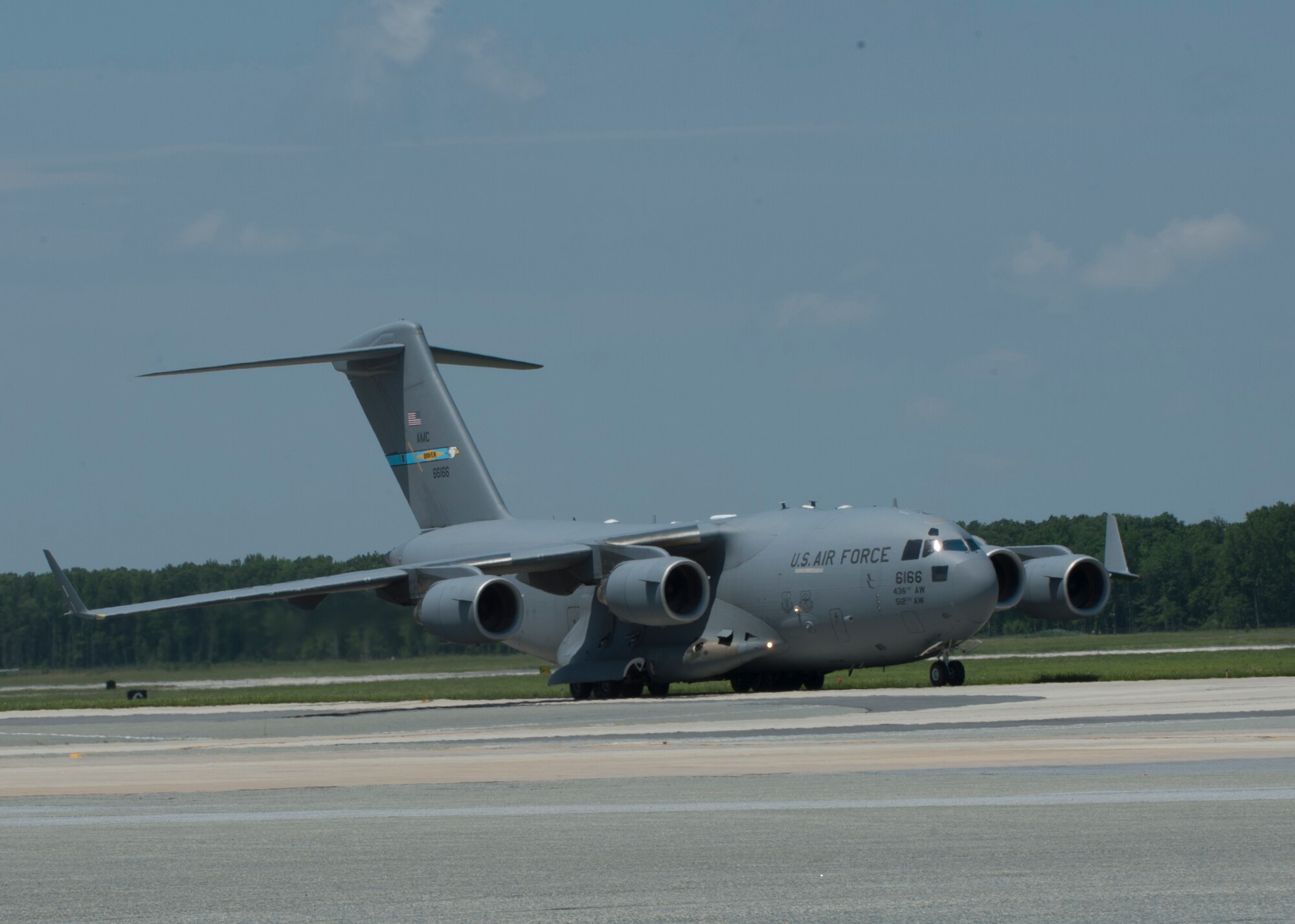 Maj. Christian Fiore and Senior Master Sgt. Kathleen Lambert, 512th Airlift Wing members, celebrated their final flight with friends and family June 27, 2016, at Dover Air Force Base, Del. Fiore has been at DAFB since 1991 and started his pilot training on this same day 14 years ago. Lambert has served with the 512th AW for 33 years and logged more than 11,000 flight hours. (U.S. Air Force Photo/ Tech. Sgt. Nathan Rivard)
