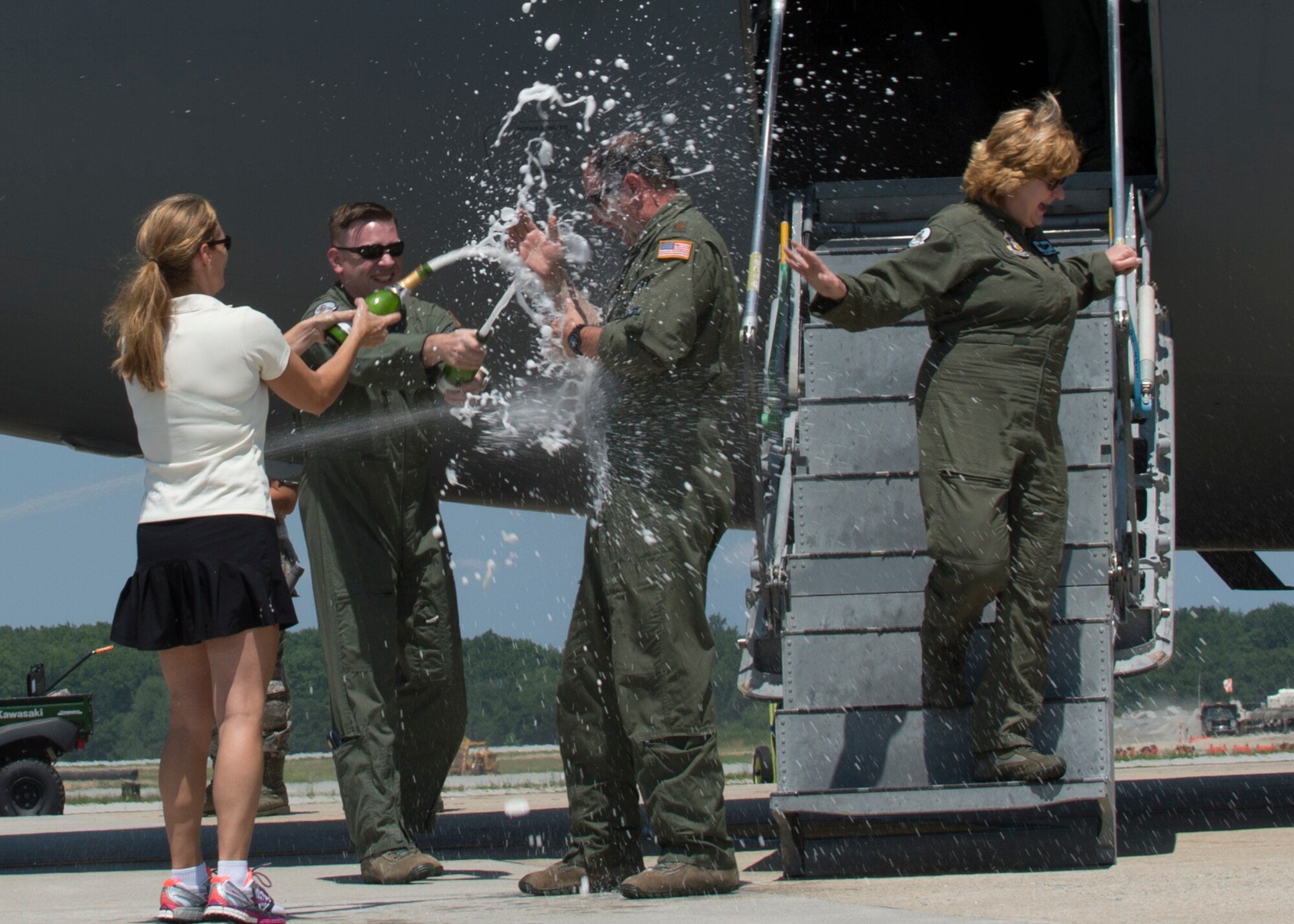 Maj. Christian Fiore and Senior Master Sgt. Kathleen Lambert, 512th Airlift Wing members, celebrated their final flight with friends and family June 27, 2016, at Dover Air Force Base, Del. Fiore has been at DAFB since 1991 and started his pilot training on this same day 14 years ago. Lambert has served with the 512th AW for 33 years and logged more than 11,000 flight hours. (U.S. Air Force Photo/ Tech. Sgt. Nathan Rivard)