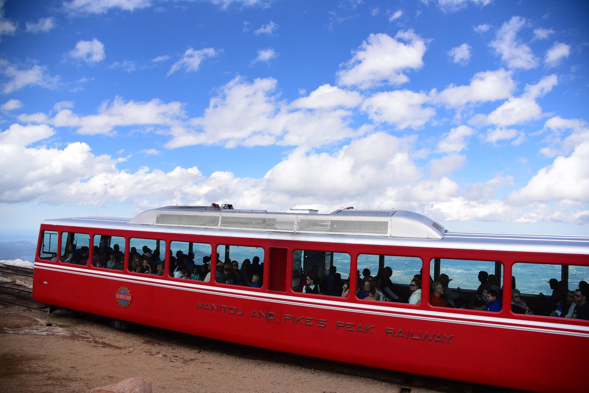 Cascade, Colo. - The Manitou and Pikes Peak Railway, also known as the Cog Railway, arrives at the summit of Pikes Peak on June 5, 2016. The Cog offers passengers a leisurely three-hour round trip to the top of America’s Mountain. (U.S. Air Force photo by Staff Sgt. Amber Grimm)