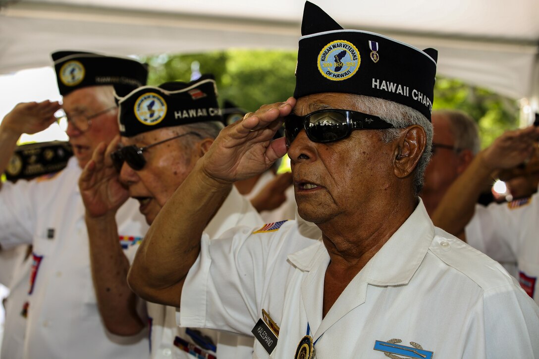 Members of the Korean War Veterans of Hawaii salute during a ceremony at the National Memorial Cemetery of the Pacific in Honolulu June 25, 2016, marking the 66th anniversary of the start of the Korean War. Marine Corps photo by Lance Cpl. Robert Sweet