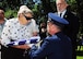 Lt. Col. Michael Epper, 341st Force Support Squadron commander, presents the flag to Dawn Thatcher, wife of Staff Sgt. David J. Thatcher, during a funeral service June 27 in Missoula, Mont. At 20 years old, Sgt. Thatcher was an engineer gunner in Flight Crew 7 of the Doolittle Tokyo Raids. His crew crash-landed into sea off the coast of China on April 18, 1942. Thatcher saved four members of the crew by pulling them to safety on the surrounding beach and applying life-saving medical treatment, even though he was injured himself. (U.S. Air Force photo by 2nd Lt. Annabel Monroe)