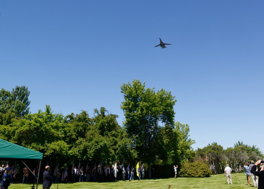 A B-1 Lancer from the 28th Bomb Wing at Ellsworth Air Force Base, S.D., performs a slow-speed flyover in honor of Staff Sgt. David J. Thatcher June 27, 2016, in Missoula, Mont. At 20 years old, and as an engineer gunner in Flight Crew 7 of the Doolittle Tokyo Raids, Thatcher’s crew crash-landed into sea off the coast of China April 18, 1942. Thatcher saved four members of the crew by pulling them to safety on the surrounding beach and applying life-saving medical treatment, even though he was injured himself. (U.S. Air Force photo by 2nd Lt. Annabel Monroe)