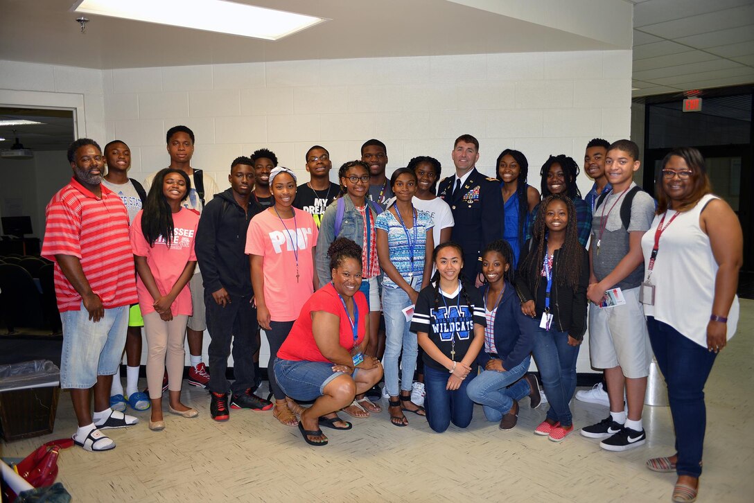 Lt. Col. Stephen F. Murphy, commander of the Nashville District, poses with students after a lecture at the Tennessee State University June 24, 2016.  The students are attending a 4-week National Summer Transportation Institute program where they gain knowledge on transportation and engineering.   