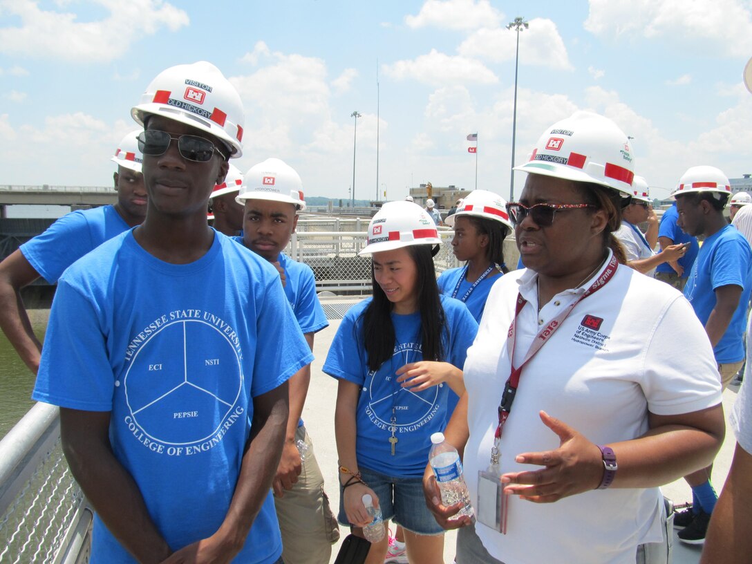 Tenesse Henderson, an electrical engineer from the Nashville District talks with students from the Tennessee State University NSTI program at the Old Hickory Lock, June 22, 2016. The students are attending the Tennessee State University Engineering Department's four-week National Summer Transportation Institute program.  