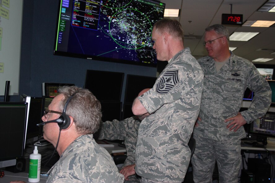 Chief Master Sgt. of the Air Force James Cody, center, visited the Western Air Defense Sector May 4.  Cody received a first hand tour of the WADS operations floor and learned how members of the unit identify, detect and defend against airborne threats over the western portion of the continental U.S. 