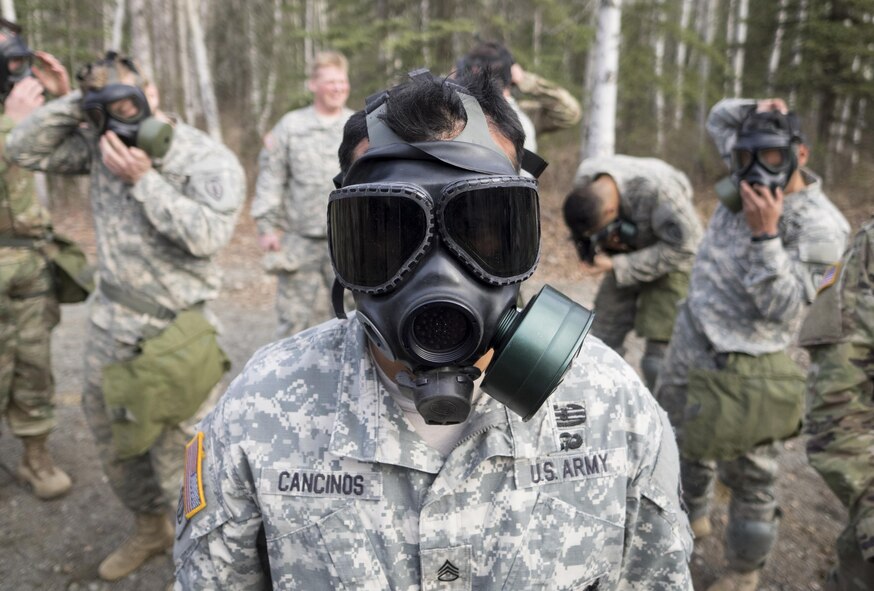 Army Staff Sgt. Henry Cancinos conducts chemical, biological, radiological and nuclear defense training.