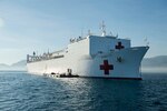 DILI, Timor Leste (June 9, 2016) Hospital ship USNS Mercy (T-AH 19) sits anchored off the coast of Timor Leste during its first mission stop of Pacific Partnership 2016. Pacific Partnership 2016 marks the sixth time the mission has visited Timor Leste since its first visit in 2006. Medical, engineering and various other personnel embarked aboard Mercy are working side-by-side with partner nation counterparts, exchanging ideas, building best practices and relationships to ensure preparedness should disaster strike. 