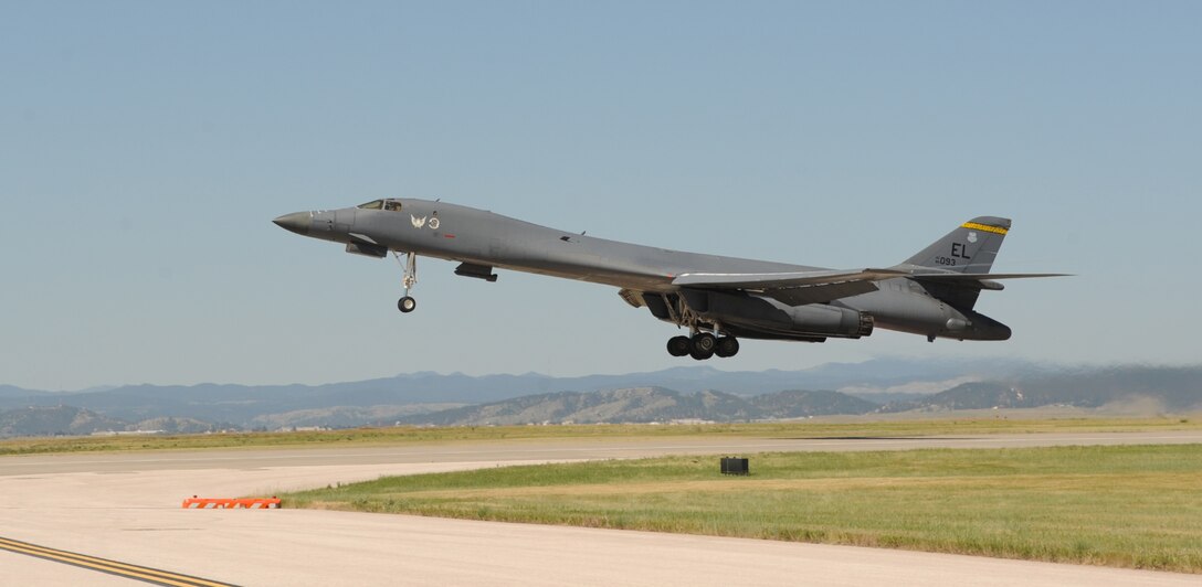 A B-1 bomber takes off From Ellsworth Air Force Base, S.D., to perform a flyover in honor of U.S. Army Air Corps Staff Sgt. David Thatcher, June 27, 2016. Thatcher was the engineer gunner of a B-25 medium-range bomber on Crew #7, “The Ruptured Duck,” during the Doolittle Raid on April 18, 1942. (U.S. Air Force photo by Airman 1st Class Denise M. Nevins/Released)