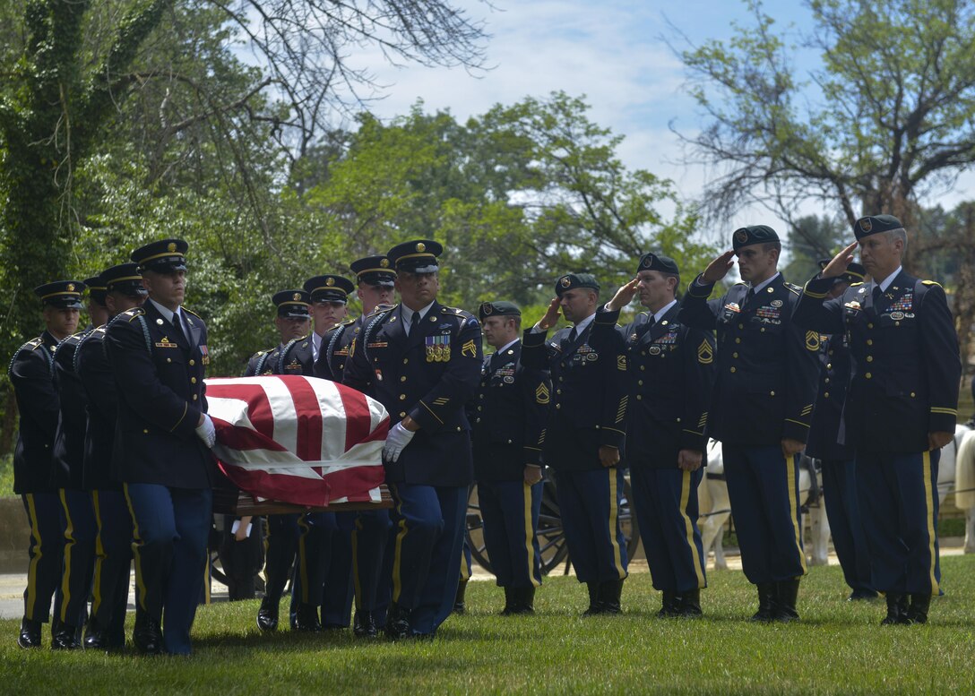 Members of the honor guard and 5th Special Forces Group escort the casket of returned Sgt. 1st Class Alan Boyer who had been Missing In Action for over 48 years during his funeral service held at the Arlington National Cemetery, June 22, 2016. Boyer was a member of Spike Team Asp, an 11-man reconnaissance team assigned to Military Assistance Command, Vietnam - Studies and Observations Group (MACV-SOG,) conducting a classified reconnaissance mission in Savannakhet Province, Laos, March 28, 1968, when the team was attacked by enemy forces. He was named MIA for over 48 years till March 2016 when his remains were returned to his family and to be laid to rest. 