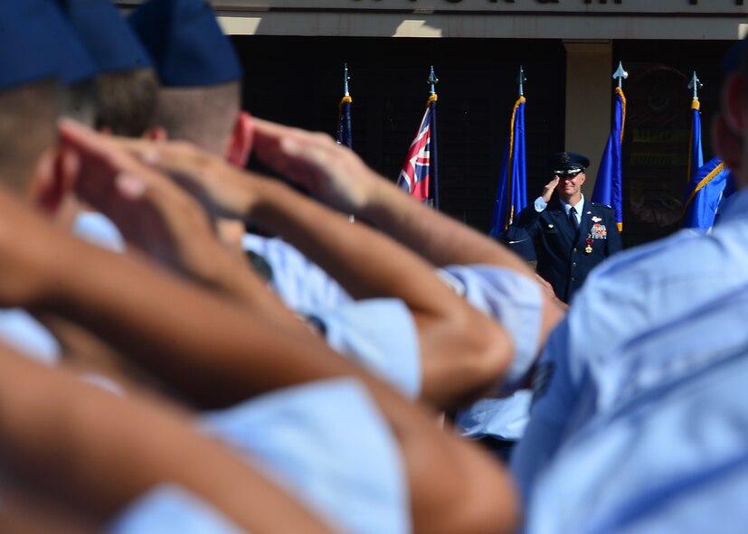 Colonel Randall Huiss, 15th Wing commander, receives his final salute from the Airmen of the 15th Wing as commander, during the 15th Wing Change of Command Ceremony on Joint Base Pearl Harbor-Hickam, June 27, 2016. During the ceremony, Huiss, former 15th Wing commander, relinquished command to Col. Kevin Gordon, 15th Wing Commander. Gordon became the 72nd commander of the 15th Wing following the ceremony today.  (U.S. Air Force photo by Tech. Sgt. Aaron Oelrich/Released)