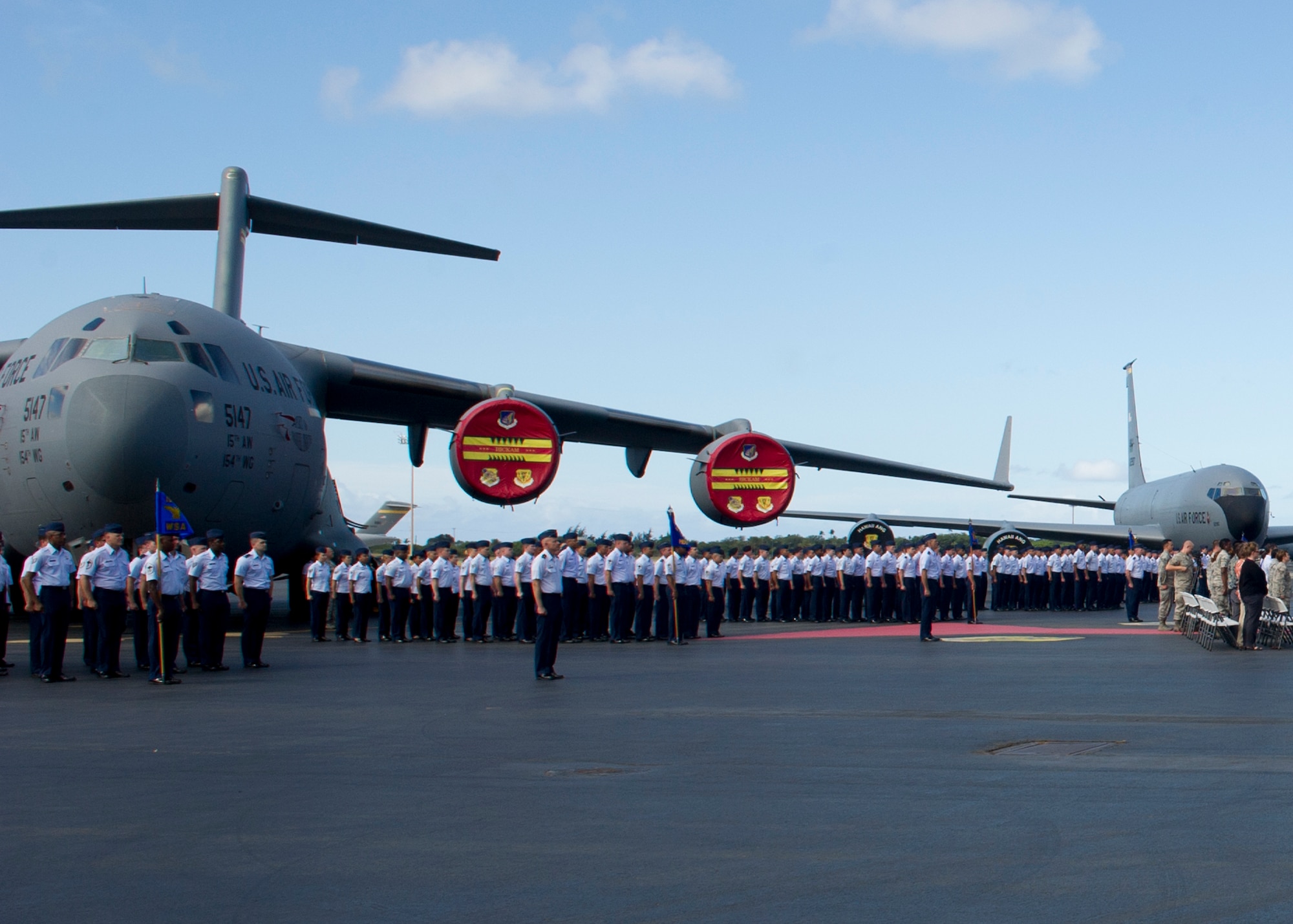 Airmen from the 15th Wing stand in formation during the 15th Wing Change of Command Ceremony on Joint Base Pearl Harbor-Hickam, June 27, 2016. During the ceremony, Col. Randall Huiss, former 15th Wing commander relinquished command to Col. Kevin Gordon. Gordon became the 72nd commander of the 15th Wing following the ceremony today.  (U.S. Air Force photo by Tech. Sgt. Aaron Oelrich/Released)