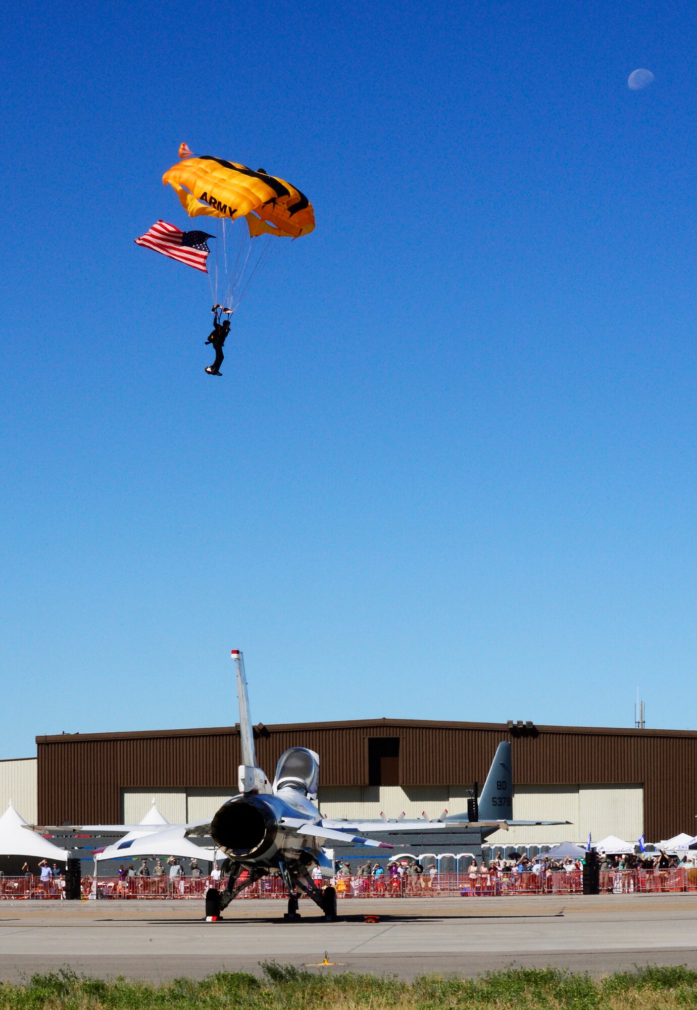 A U.S. Army Golden Knights parachutist descends toward the ground during opening ceremonies for the Warriors Over the Wasatch Air Show and Open House at Hill Air Force Base, June 25, 2016. (U.S. Air Force photo by David Perry)