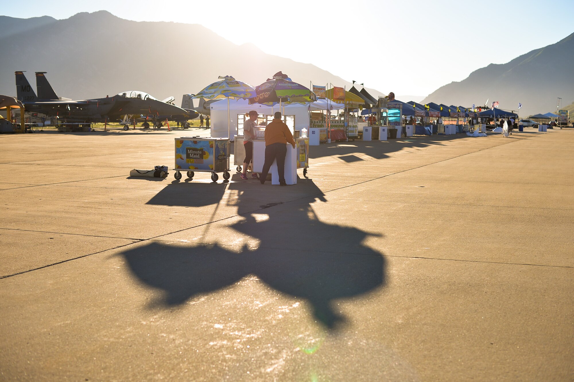 Vendors and volunteers get ready before gates open for the Warriors Over the Wasatch Air Show and Open House at Hill Air Force Base, June 26. (U.S. Air Force photo b R. Nial Bradshaw)