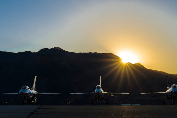 U.S. Air Force Thunderbirds jets sit on the flightline at Hill Air Force Base, June 26, before the gates opened for the Warriors Over the Wasatch Air Show and Open House. Hundreds of thousands attended the 2-day event. (U.S. Air Force photo by Paul Holcomb)