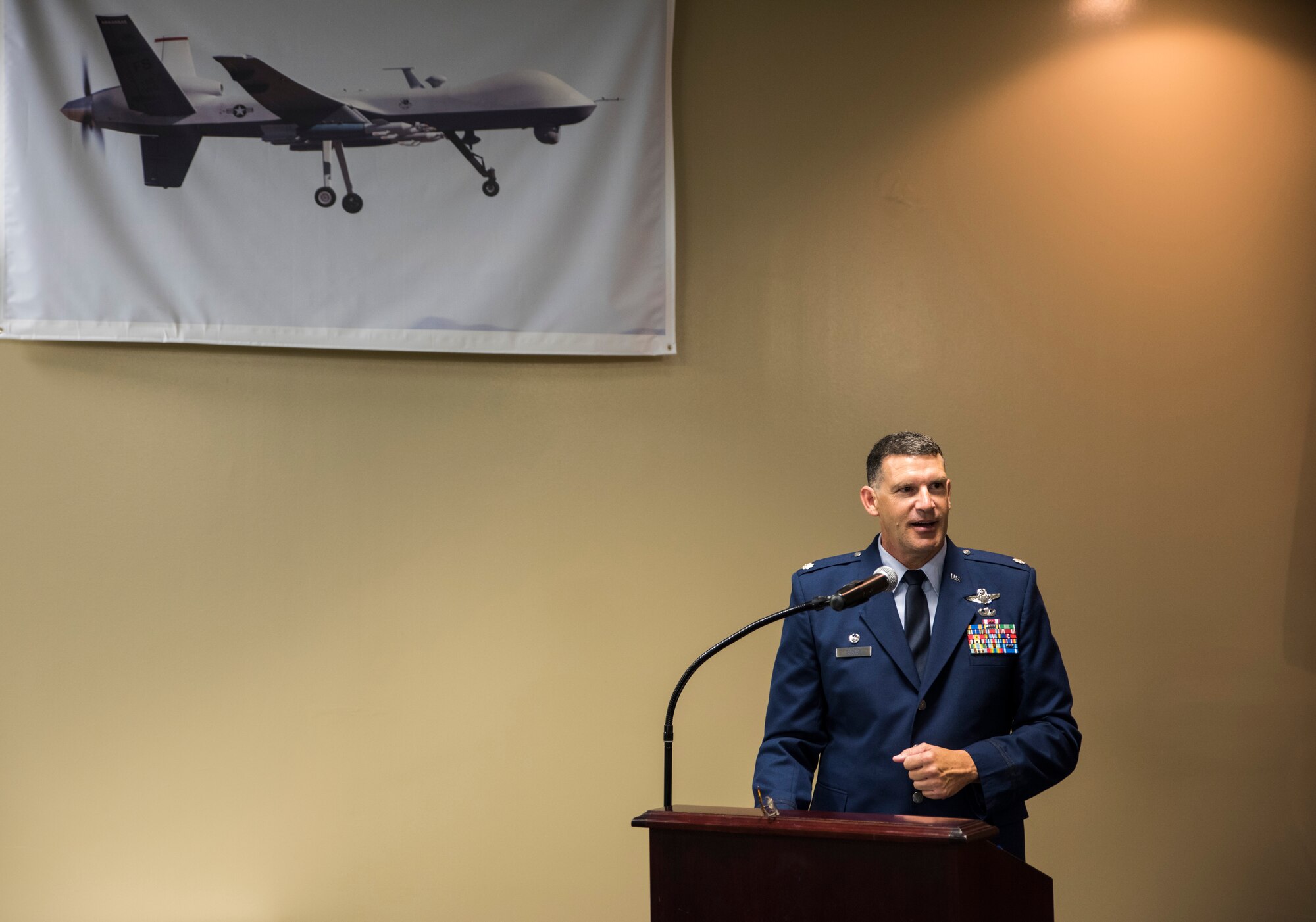 Lt. Col. Leon Dodroe expresses how grateful and excited he is June 26, 2016, to join the 188th OG as he assumes command of the 188th Operations Group at Ebbing Air National Guard Base, Fort Smith, Ark. As commander, Dodroe will complete the wing’s mission conversion to the MQ-9 Reaper and continue the custom of professionalism and dedication within the 188th OG. (U.S. Air National Guard photo by Senior Airman Cody Martin/Released)