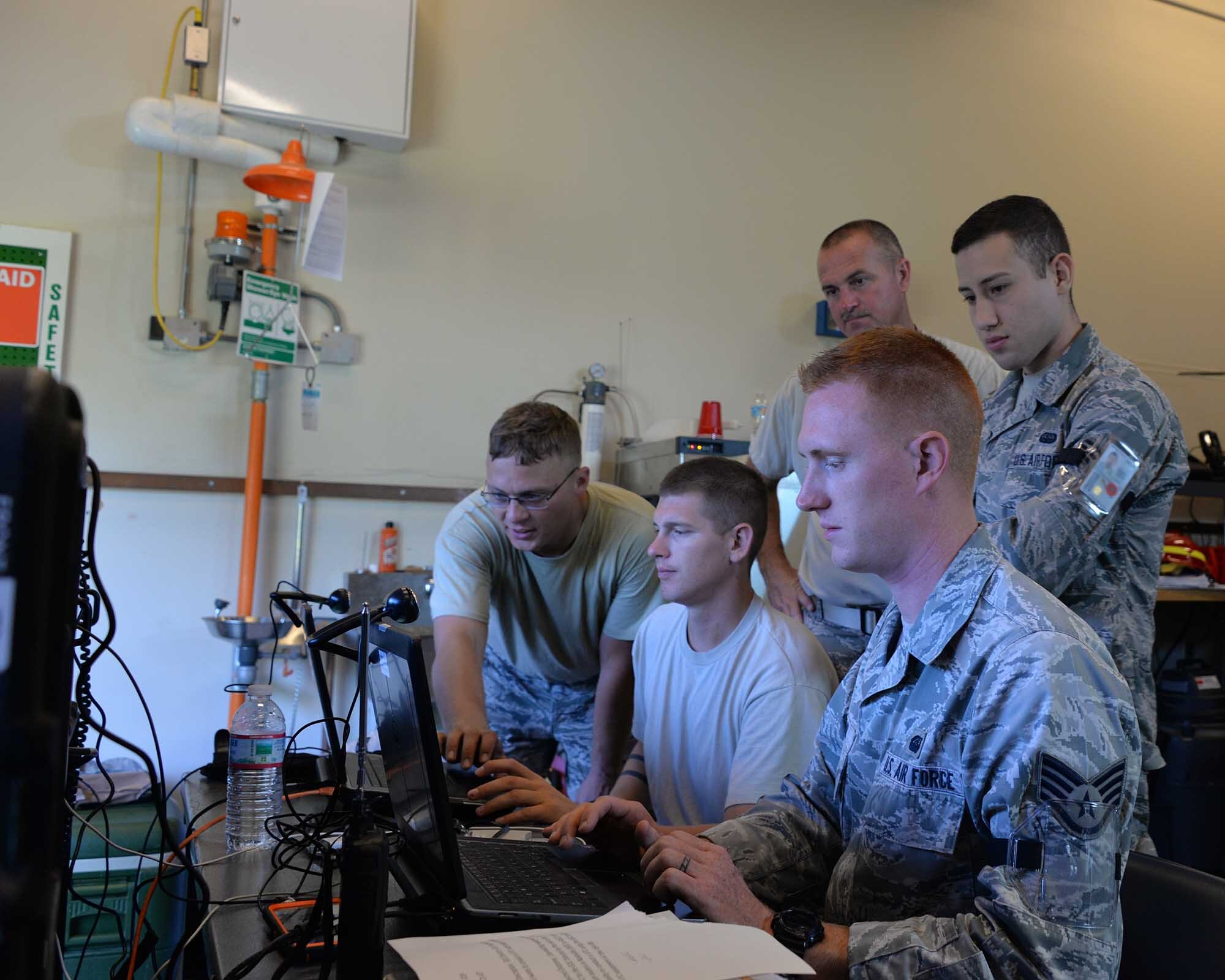 Airmen from the 119th  Command and Control Squadron provide communication accessibility using the Joint Incident Site Communication Capability Terminal (JISCC) at Memphis Air National Guard Base, Tennessee during the Tennessee Maneuvers 2016 Exercise June 21.  (U.S. Air National Guard photo by Staff Sgt. Dan Gagnon, 134 ARW Public Affairs)