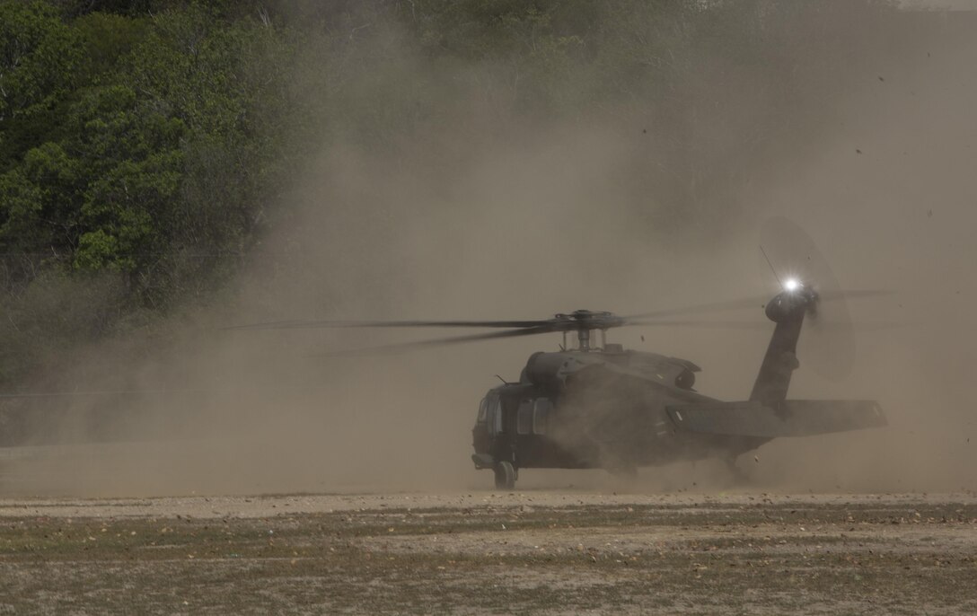 A UH-60 Blackhawk hastily lands to begin casualty evacuation drills during Exercise Tradewinds 2016, at Twickenham Park Gallery Range, Jamaica, June 23, 2016. Tradewinds is designed to conduct joint, combined and interagency participating nation capacity building focuses on increasing regional cooperation in complex multinational security operations and humanitarian assistance. 