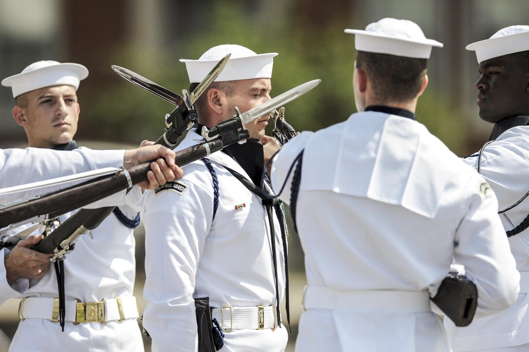 Sailors with the Navy Ceremonial Guard perform during a change of command ceremony at Joint Base Anacostia-Bolling in Washington, D.C., June 24, 2016. Air National Guard photo by Staff Sergeant Christopher S. Muncy