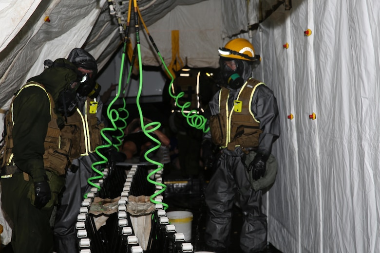 Marines and Sailors with Chemical Biological Incident Response Force train alongside the Fire Department of New York for a field training exercise at the F.D.N.Y. training academy in Randall’s Island, N.Y. June 20, 2016. CBIRF is an active duty Marine Corps unit that, when directed, forward-deploys and/or responds with minimal warning to a chemical, biological, radiological, nuclear or high-yield explosive (CBRNE) threat or event in order to assist local, state, or federal agencies and the geographic combatant commanders in the conduct of CBRNE response or consequence management operations, providing capabilities for command and control; agent detection and identification; search, rescue, and decontamination; and emergency medical care for contaminated personnel. (Official USMC Photo by Lance Cpl. Maverick S. Mejia/RELEASED)