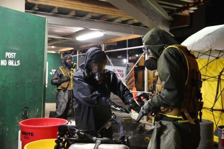 Marines and Sailors with Chemical Biological Incident Response Force train alongside the Fire Department of New York for a field training exercise at the F.D.N.Y. training academy in Randall’s Island, N.Y. June 20, 2016. CBIRF is an active duty Marine Corps unit that, when directed, forward-deploys and/or responds with minimal warning to a chemical, biological, radiological, nuclear or high-yield explosive (CBRNE) threat or event in order to assist local, state, or federal agencies and the geographic combatant commanders in the conduct of CBRNE response or consequence management operations, providing capabilities for command and control; agent detection and identification; search, rescue, and decontamination; and emergency medical care for contaminated personnel. (Official USMC Photo by Lance Cpl. Maverick S. Mejia/RELEASED)