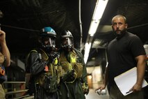 Marines and Sailors with Chemical Biological Incident Response Force train alongside the Fire Department of New York for a field training exercise at the F.D.N.Y. training academy in Randall’s Island, N.Y. June 20, 2016. CBIRF is an active duty Marine Corps unit that, when directed, forward-deploys and/or responds with minimal warning to a chemical, biological, radiological, nuclear or high-yield explosive (CBRNE) threat or event in order to assist local, state, or federal agencies and the geographic combatant commanders in the conduct of CBRNE response or consequence management operations, providing capabilities for command and control; agent detection and identification; search, rescue, and decontamination; and emergency medical care for contaminated personnel. (Official USMC Photo by Lance Cpl. Maverick S. Mejia/RELEASED)