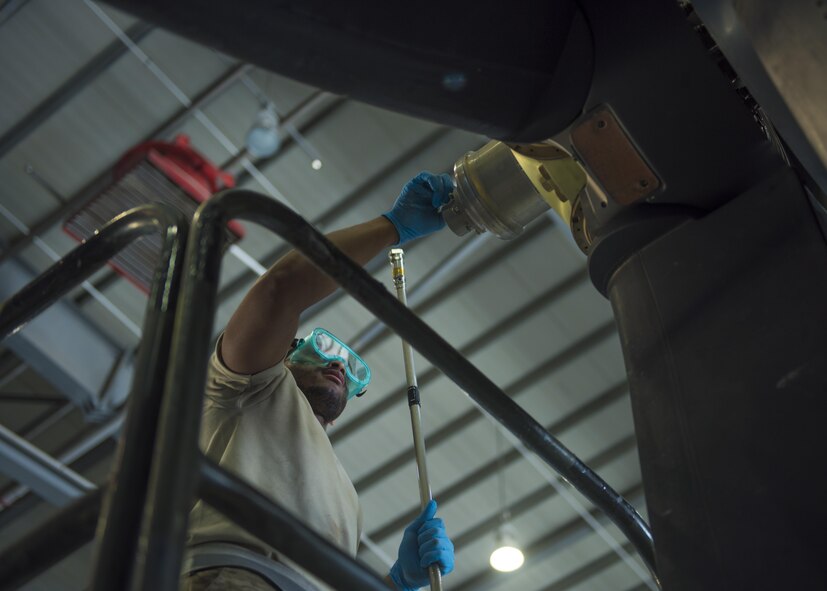 Senior Airman Shannon Wilson, 455th Expeditionary Aircraft Maintenance Squadron crew chief, uses a beta tube spanner wrench to replace a beta tube in a C-130J Super Hercules engine, June 27, 2016, Bagram Airfield, Afghanistan. Members of the 455th EAMXS. (U.S. Air Force photo by Senior Airman Justyn M. Freeman)