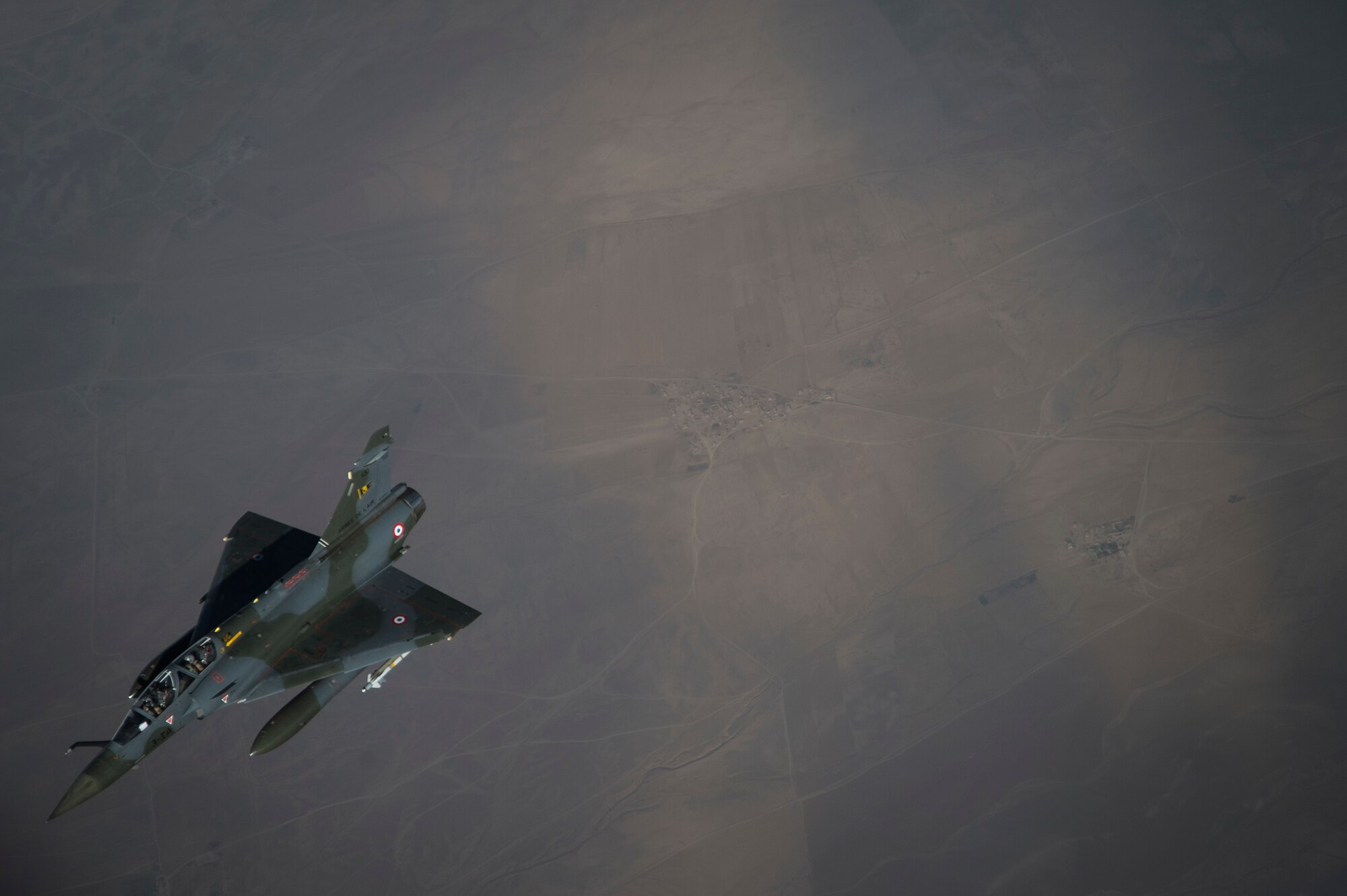 A French Air Force Mirage 2000 descends off the KC-135 Stratotanker refueling boom over Iraq, June 15, 2016. Airmen from the 340th Expeditionary Air Refueling Squadron refueled the French Air Force's multirole fighter jet, the Mirage 2000 over Iraq, in support of Combined Joint Task Force-Operation Inherent Resolve. The U.S. and more than 60 coalition partners work together to eliminate the terrorist group ISIL and the threat they pose to Iraq and Syria.
(U.S. Air Force photo/Staff Sgt. Larry E. Reid Jr., Released)