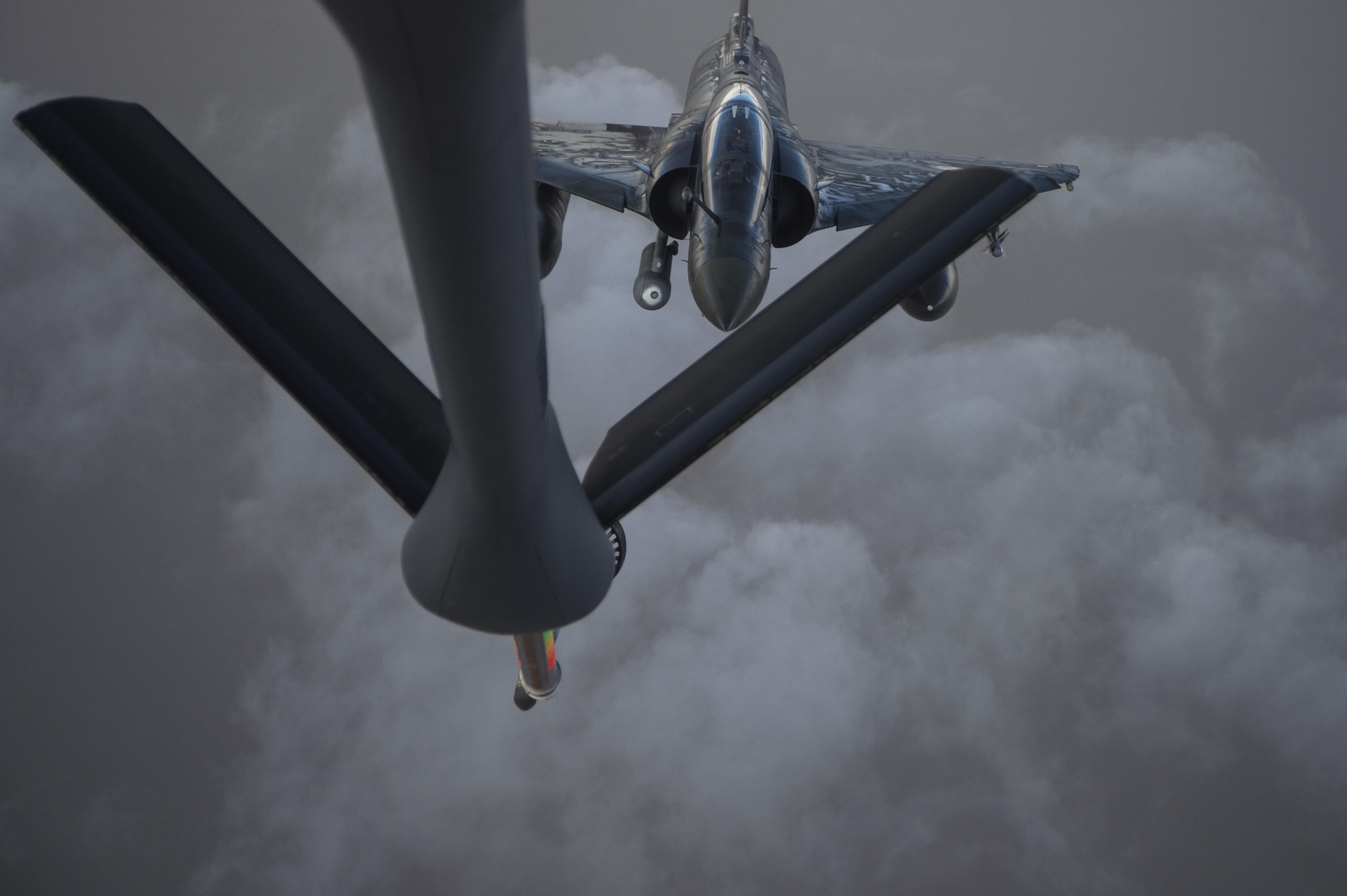 A French Air Force Mirage 2000 approaches the KC-135 Stratotanker refueling boom over Iraq, June 15, 2016. Airmen from the 340th Expeditionary Air Refueling Squadron refueled the French Air Force's multirole fighter jet, the Mirage 2000 over Iraq, in support of Combined Joint Task Force-Operation Inherent Resolve. The U.S. and more than 60 coalition partners work together to eliminate the terrorist group ISIL and the threat they pose to Iraq and Syria.
(U.S. Air Force photo/Staff Sgt. Larry E. Reid Jr., Released)