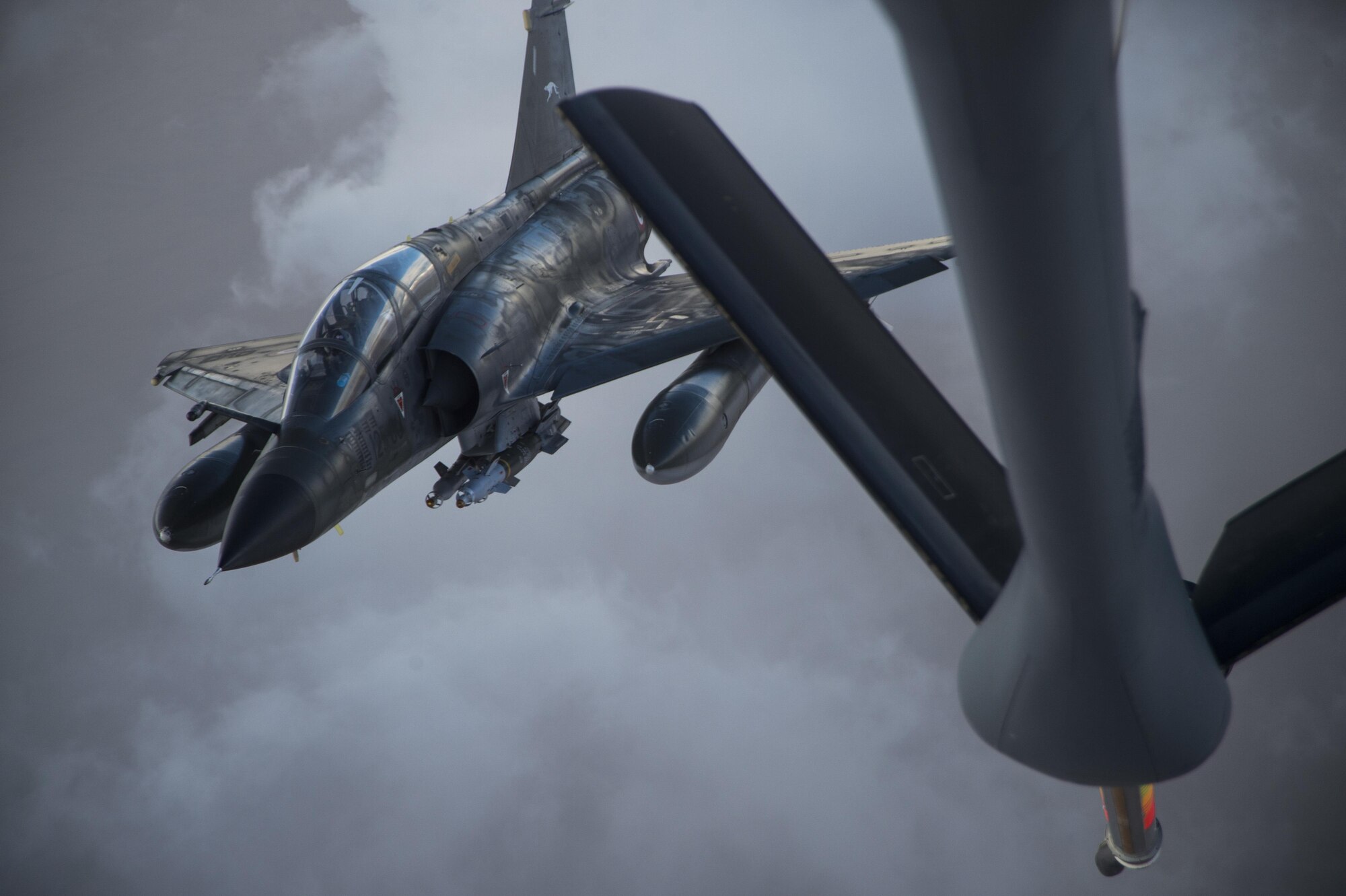 A French Air Force Mirage 2000 descends off the KC-135 Stratotanker refueling boom over Iraq, June 15, 2016. Airmen from the 340th EARS refueled the French Air Force's multirole fighter jet, the Mirage 2000 over Iraq, in support of Combined Joint Task Force-Operation Inherent Resolve. The U.S. and more than 60 coalition partners work together to eliminate the terrorist group ISIL and the threat they pose to Iraq and Syria.
(U.S. Air Force photo/Staff Sgt. Larry E. Reid Jr., Released)