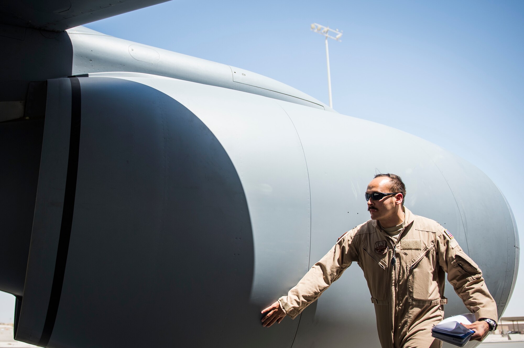 Capt. Michael Audiss, a KC-135 Stratotanker pilot assigned to the 340th Expeditionary Air Refueling Squadron, conducts a walk around of his aircraft before a sortie at Al Udeid Air Base, Qatar, June 15, 2016. Airmen from the 340th EARS refueled the French Air Force's multirole fighter jet, the Mirage 2000 over Iraq, in support of Combined Joint Task Force-Operation Inherent Resolve. The U.S. and more than 60 coalition partners work together to eliminate the terrorist group ISIL and the threat they pose to Iraq and Syria.
(U.S. Air Force photo/Staff Sgt. Larry E. Reid Jr., Released)