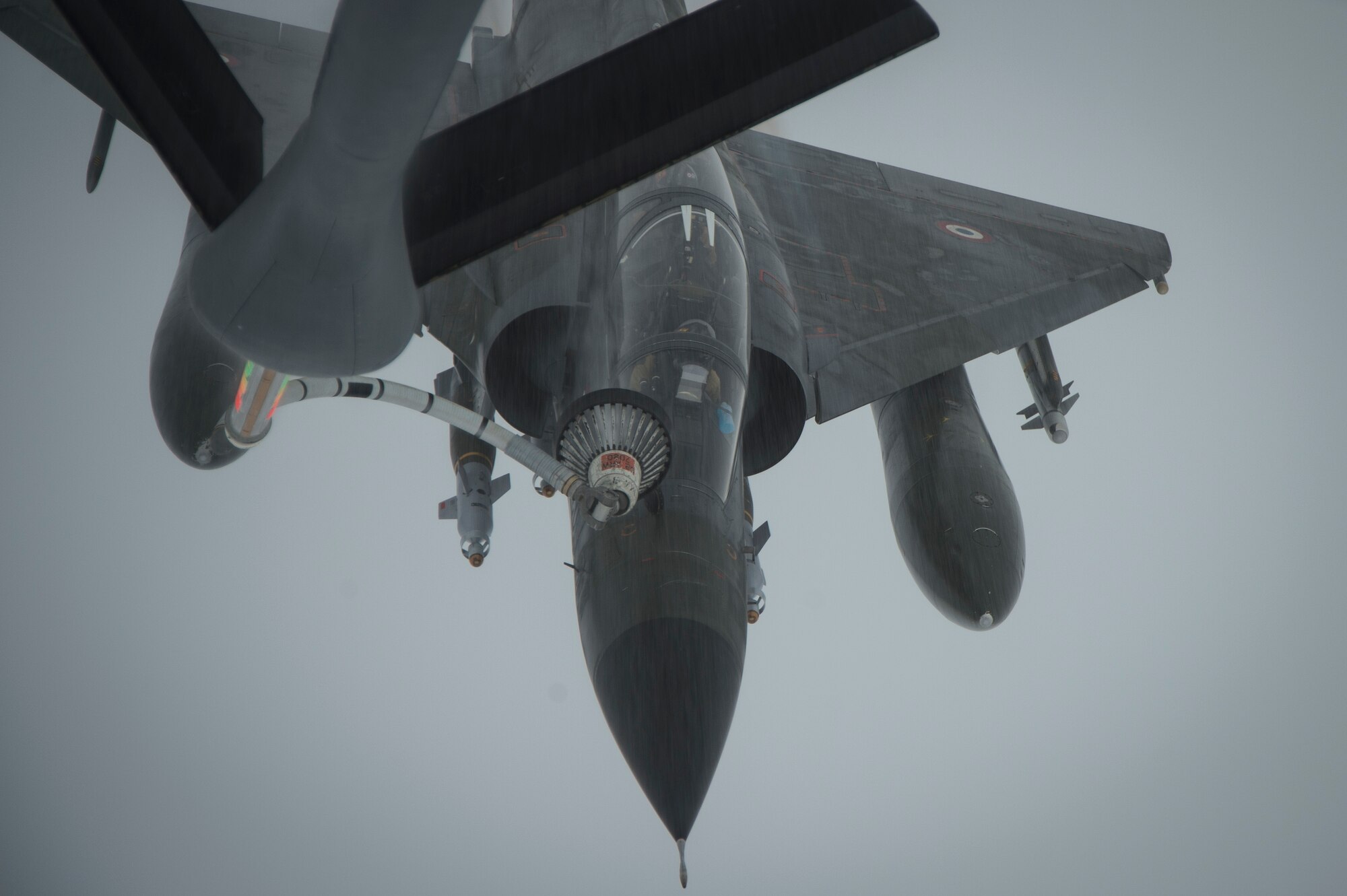 A French Air Force Mirage 2000 receives fuel from a KC-135 Stratotanker, assigned to the 340th Expeditionary Air Refueling Squadron, over Iraq, June 15, 2016. Airmen from the 340th EARS refueled the French Air Force's multirole fighter jet, the Mirage 2000 over Iraq, in support of Combined Joint Task Force-Operation Inherent Resolve. The U.S. and more than 60 coalition partners work together to eliminate the terrorist group ISIL and the threat they pose to Iraq and Syria.
(U.S. Air Force photo/Staff Sgt. Larry E. Reid Jr., Released)