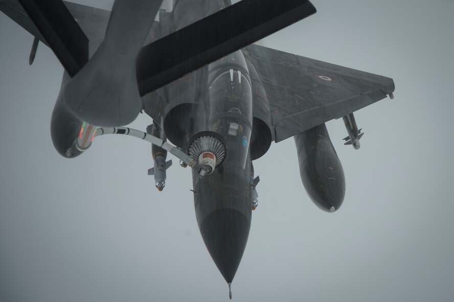A French Air Force Mirage 2000 receives fuel from a KC-135 Stratotanker, assigned to the 340th Expeditionary Air Refueling Squadron, over Iraq, June 15, 2016. Airmen from the 340th EARS refueled the French Air Force's multirole fighter jet, the Mirage 2000 over Iraq, in support of Combined Joint Task Force-Operation Inherent Resolve. The U.S. and more than 60 coalition partners work together to eliminate the terrorist group ISIL and the threat they pose to Iraq and Syria.
(U.S. Air Force photo/Staff Sgt. Larry E. Reid Jr., Released)