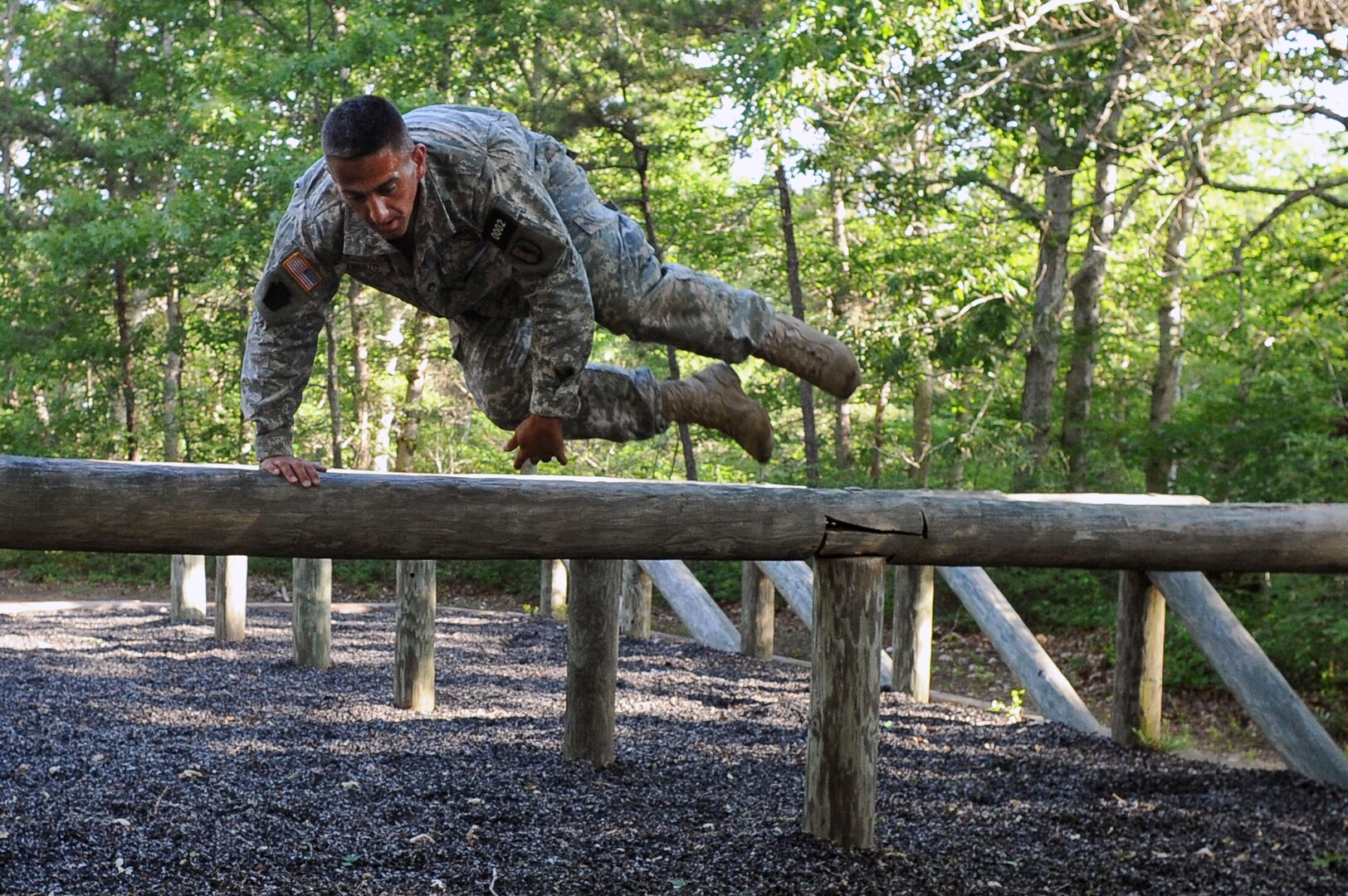 Army Staff Sgt. Dirk Omerzo, an instructor with the Pennsylvania Army National Guard’s 3rd Battalion, 166TH Regiment (Regional Training Institute), navigates an obstacle while competing in the 2016 Army National Guard Best Warrior Competition at Joint Base Cape Cod, Mass., June 22, 2016. Omerzo was named the NCO of the Year.