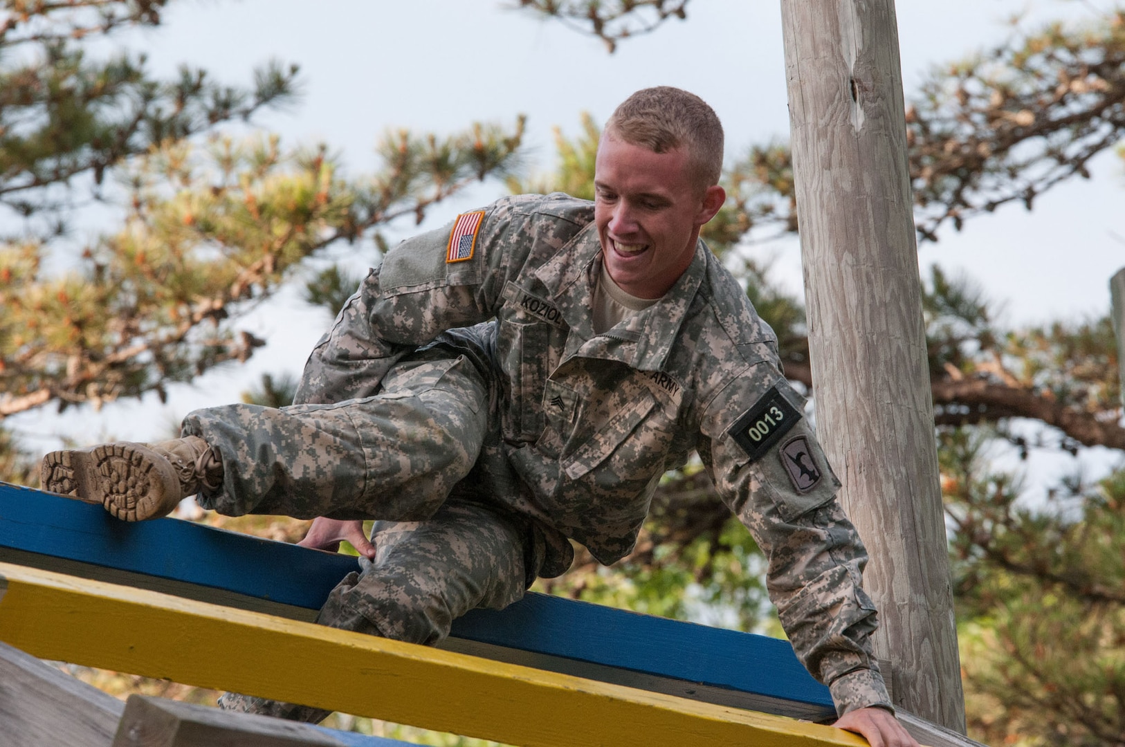 Army Sgt. Calvin Koziol, an Infantryman with Charlie Company, 1-134th Cavalry Squadron, Nebraska Army National Guard, negotiates through the obstacle course in the 2016 Army National Guard Best Warrior Competition at Camp Edwards on Joint Base Cape Cod, June 22, 2016. Koziol was named the 2016 Army National Guard Soldier of the Year at the end of the competition, which tested competitors on a variety of tactical and technical skills over a physically and mentally demanding three days. Army Staff Sgt. Dirk Omerzo, a Basic Leader Course Instructor, 3-166th Regiment, Pennsylvania Army National Guard, was named the Army National Guard's NCO of the Year. 