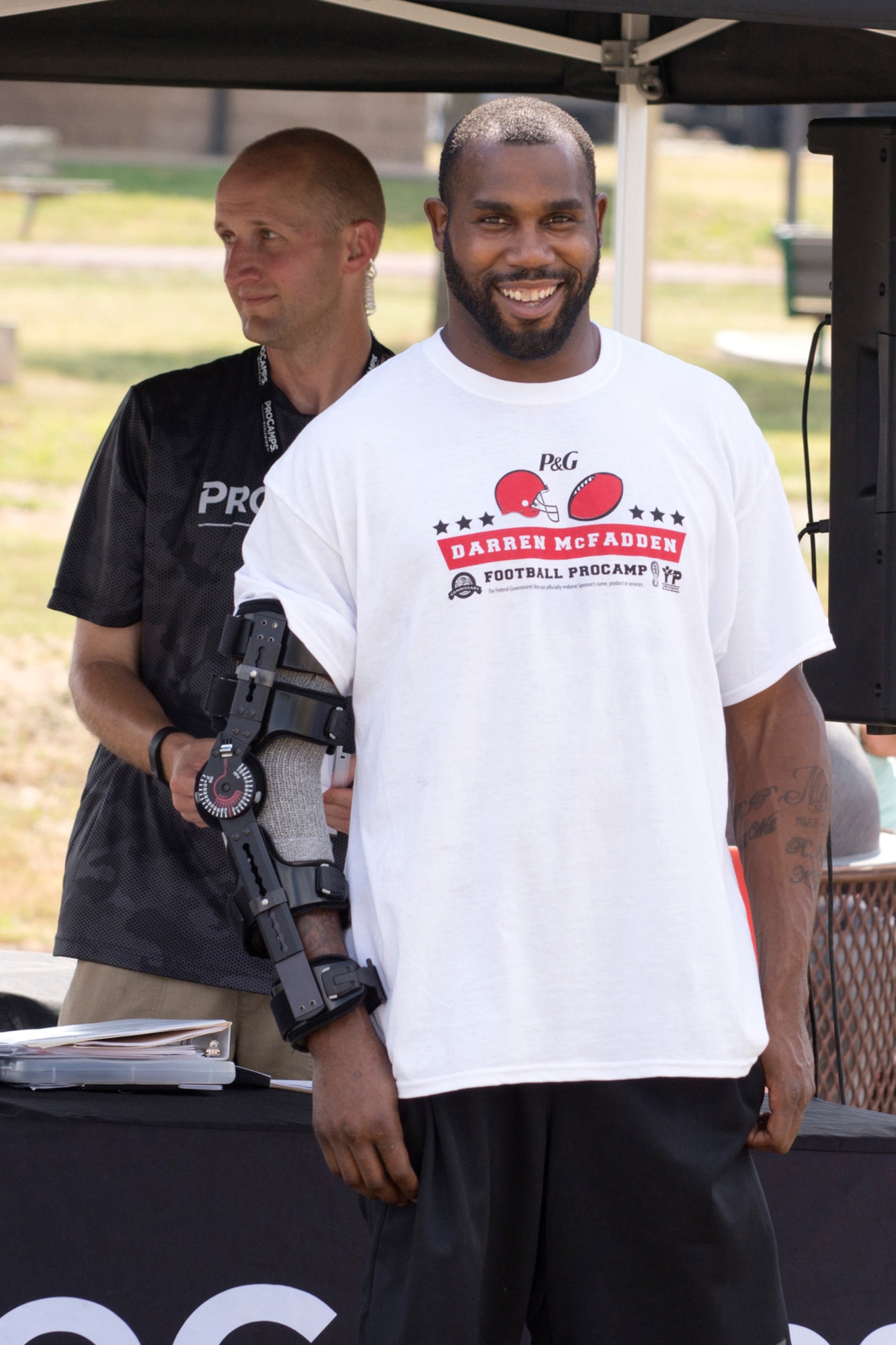 Dallas Cowboy running back Darren McFadden at the opening ceremonies of the Football ProCamp held at Little Rock Air Force Base, Ark., June 23, 2016. More than 100 campers attended the two-day event, which was free to children in grades 1-8, of Reserve, Guard and active duty personnel, offered instruction on fundamental skills and the finer points of football. (U.S. Air Force photo by Master Sgt. Jeff Walston/Released)
