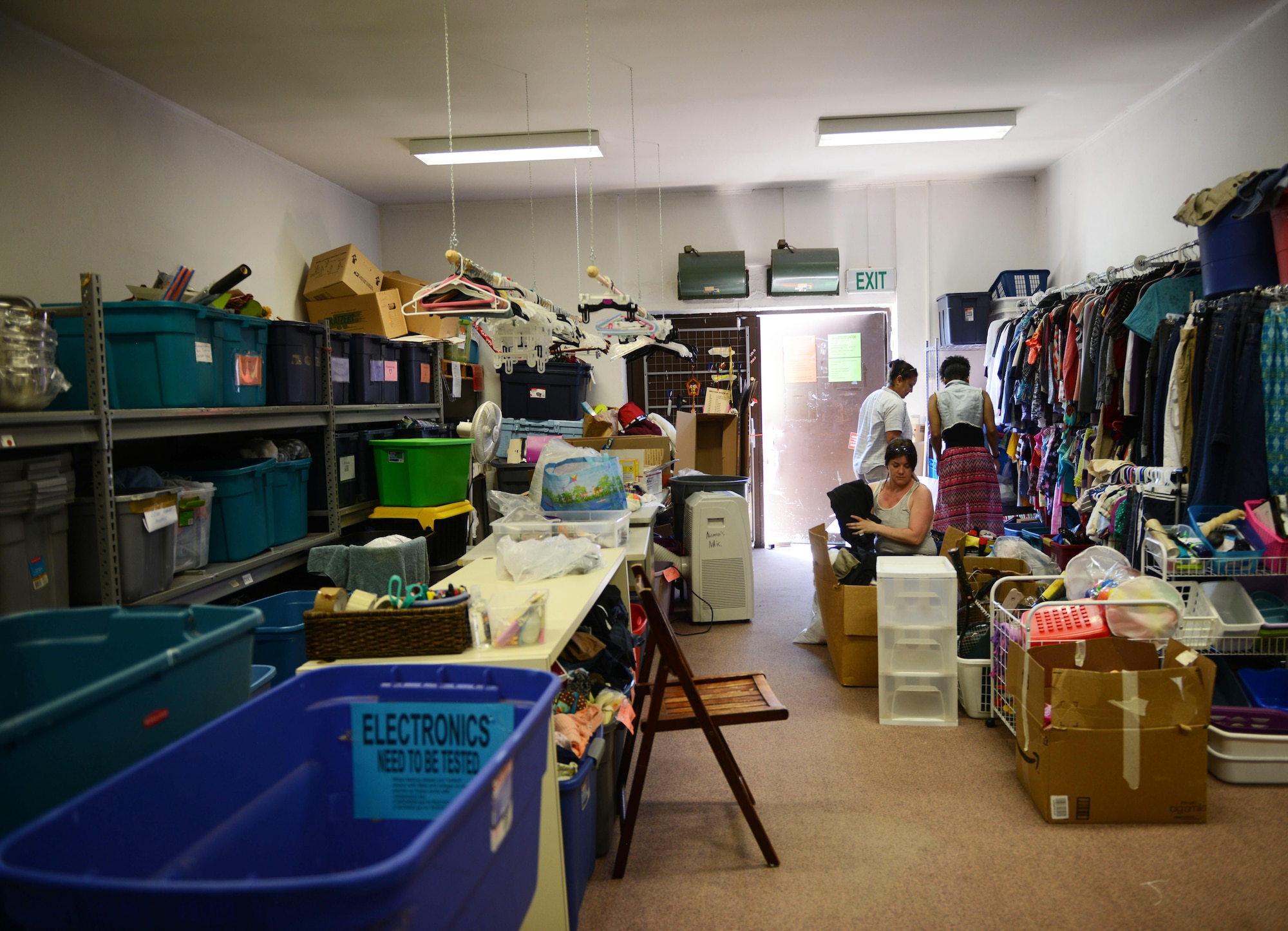 Airman’s Attic volunteers sort donations at Ramstein Air Base, Germany, June 24, 2016. The Airman’s Attic is dependent upon volunteers to run its operations. (U.S. Air Force Photo/ Airman 1st Class Joshua Magbanua)