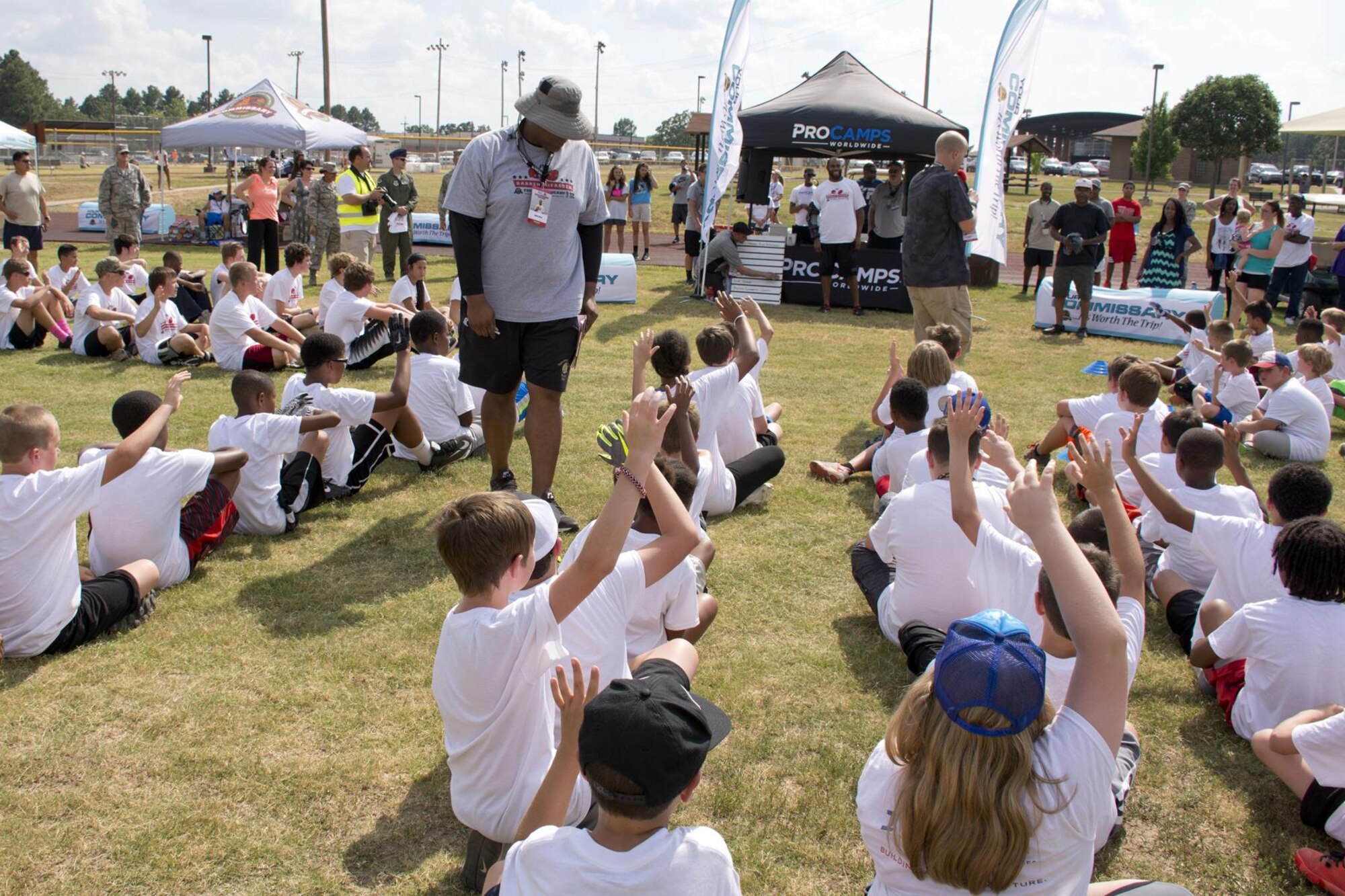 Opening ceremonies for the Darren McFadden Football ProCamp at Little Rock Air Force Base, Ark., June 23, 2016. McFadden, a running back for the Dallas Cowboys of the National Football League, hosted the two-day ProCamp, which offered free instruction on fundamental skills and the finer points of football to military children in grades 1-8. (U.S. Air Force photo by Master Sgt. Jeff Walston/Released)
