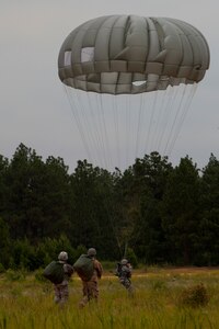 U.S. Army Reserve Paratroopers participate in an airborne operation hosted by the U.S. Army Civil Affairs & Psychological Operations Command (Airborne) at St. Mere Elise Drop Zone near Fort Bragg, N.C. on June 25, 2016.  USACAPOC (A), an Army Reserve unit, conducts airborne operations in order to maintain currency and proficiency. USACAPOC(A) supports the Army and Joint Force with strategic, operational, and tactical civil affairs, military information support, and information operations capabilities across the range of military operations. (U.S. Army photo by Staff Sgt. Felix R. Fimbres)