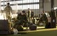 Members of the 41 Canadian Brigade Group prepare their gear in the Pride Hangar at Ellsworth Air Force Base, S.D., June 23, 2016. Approximately 240 soldiers provided mission command for engineering units supporting the South Dakota National Guard’s Golden Coyote exercise. (U.S. Air Force photo by Airman Donald Knechtel/Released)