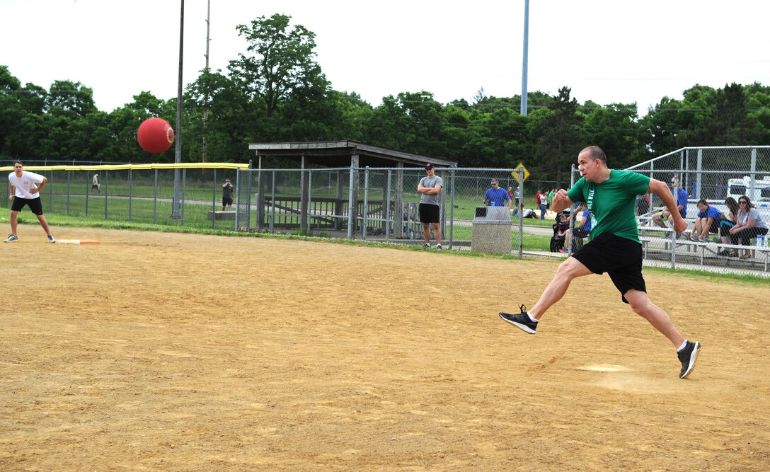Members of the National Air and Space Intelligence Center play flag football during the Center's annual Sports Fest at the Jarvis Gym track on Wright-Patterson Air Force Base, Ohio, June 17, 2016. (U.S. Air Force photo/Senior Airman William K. Veyon)