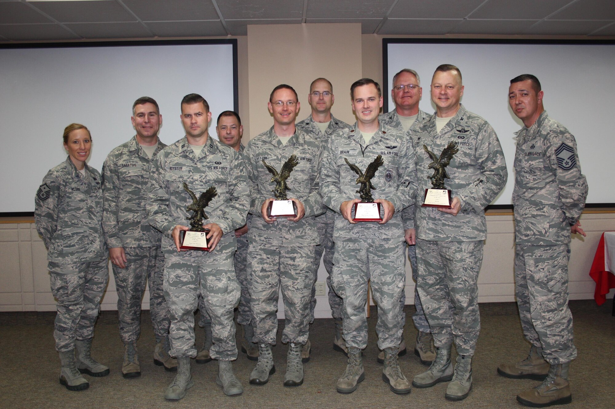 The Western Air Defense Sector wins First Air Force Command and Control Unit of the Year.  Individual unit members win the Field Grade Officer of the Year, Command and Control (C2) Officer Warrior of the Year, and C2 Enlisted Warrior of the Year.  Pictured from left to right are: Master Sgt. Dawn Kloos, 225th Air Defense Group (ADG) first sergeant; Chief Master Sgt. George Saratsis, First Air Force awards presenter; Capt. Tyler Royster, C2 Officer Warrior of the Year; Chief Master Sgt. Daniel Rebstock, 225th Support Squadron superintendent, Tech. Sgt. Ryc Cyr, C2 Enlisted Warrior of the Year; Lt. Col. Brett Bosselmann, 225th Air Defense Group commander; Maj. Antony Braun, Field Grade Officer of the Year; Col. William Krueger, 225th ADG commander; Col. Gregor Leist, Western Air Defense Sector commander; and Chief Master Sgt. Allan Lawson, 225th ADS superintendent.  