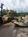 Members of the 811th Ordnance Company, 321st Ordnance Battalion, 38th Regional Support Group, perform rescue in partnership with local and state emergency first responders in the town of Rainelle, W.Va., following severe weather and flooding throughout the state 24 June, 2016.