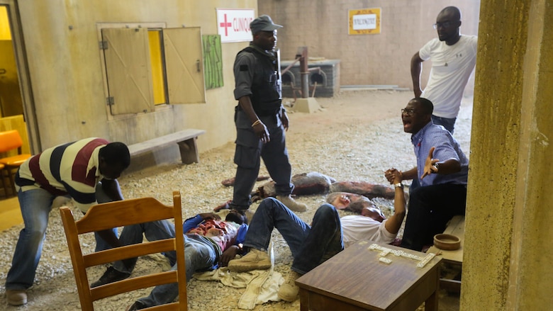 Marines with Company B, 1st Battalion, 2nd Marine Regiment, train in a simulated African village where they conduct patrols and defend a village from insurgents operating nearby during a training exercise at Marine Corps Base Camp Lejeune, N.C., June 23, 2016. Marines were able to practice tactics, communication within the unit, and combat readiness in a realistic training scenario, which better prepared them for a deployed environment. 