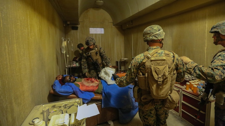 Marines with Company B, 1st Battalion, 2nd Marine Regiment, train in a simulated African village where they conduct patrols and defend a village from insurgents operating nearby during a training exercise at Marine Corps Base Camp Lejeune, N.C., June 23, 2016. Marines were able to practice tactics, communication within the unit, and combat readiness in a realistic training scenario, which better prepared them for a deployed environment. 