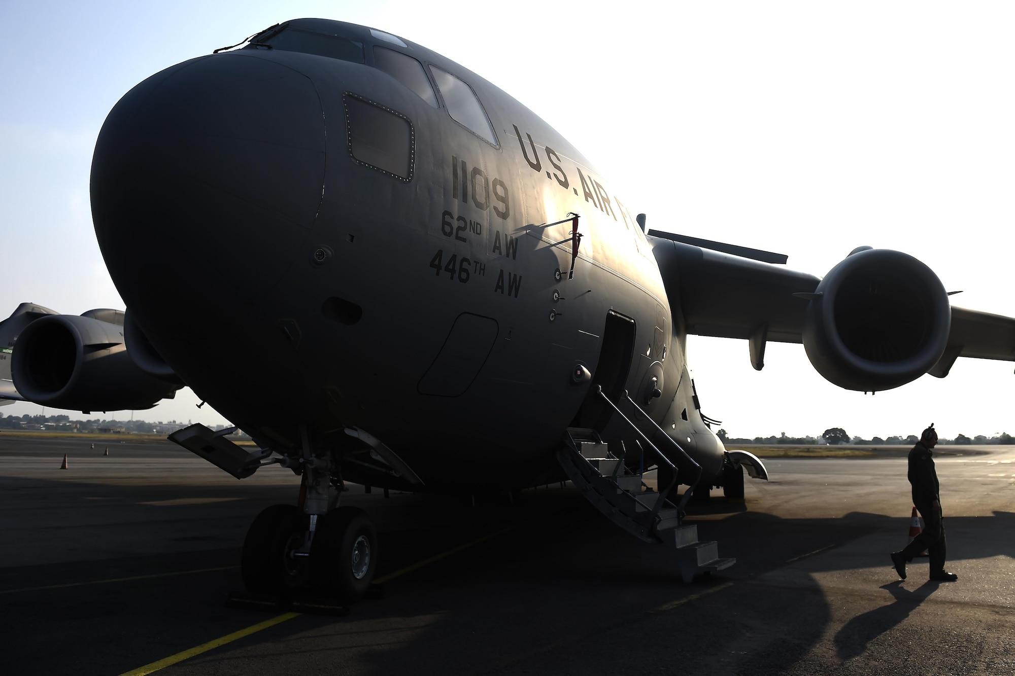Staff Sgt. Matthew Phillips, 62nd Aircraft Maintenance Squadron flying crew chief, prepares a C-17 Globemaster III for flight June 24, 2016, in Libreville, Gabon Africa. FCC’s are maintenance Airmen who are embedded with air crews to perform maintenance duties in locations without proper support facilities and personnel. (U.S. Air Force photo/Tech. Sgt. Tim Chacon) 
