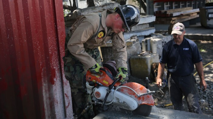Marines and Sailors with Chemical Biological Incident Response Force train alongside the Fire Department of New York for a field training exercise at the F.D.N.Y. training academy in Randall’s Island, N.Y. June 20, 2016. CBIRF is an active duty Marine Corps unit that, when directed, forward-deploys and/or responds with minimal warning to a chemical, biological, radiological, nuclear or high-yield explosive threat or event in order to assist local, state, or federal agencies and the geographic combatant commanders in the conduct of CBRNE response or consequence management operations, providing capabilities for command and control; agent detection and identification; search, rescue, and decontamination; and emergency medical care for contaminated personnel.